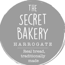 The Secret Bakery logo